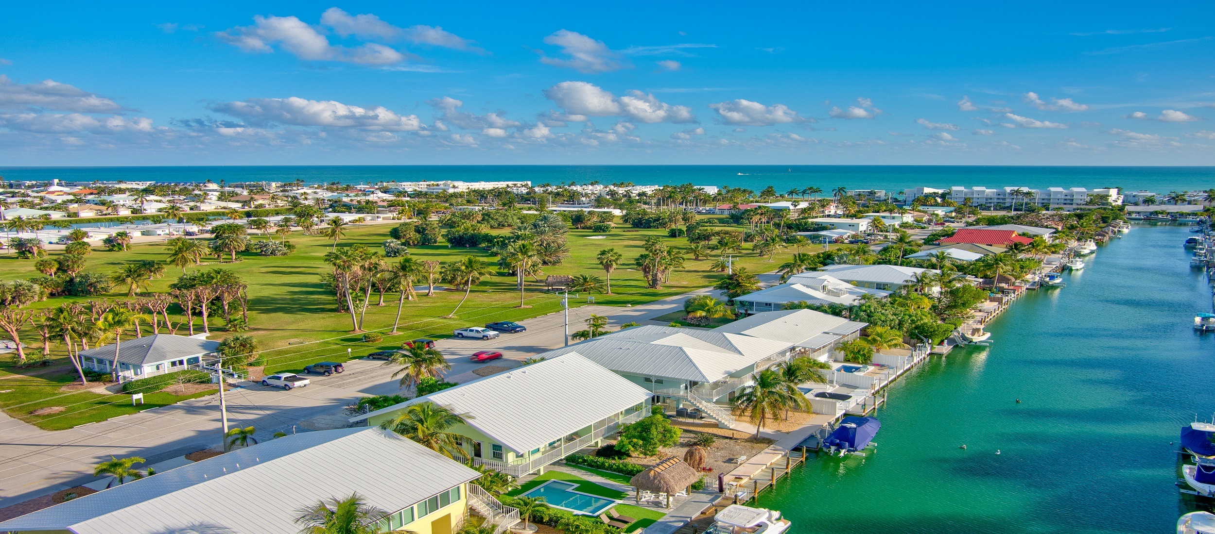 Aerial view of Key Colony beach waterfront homes and golf course
